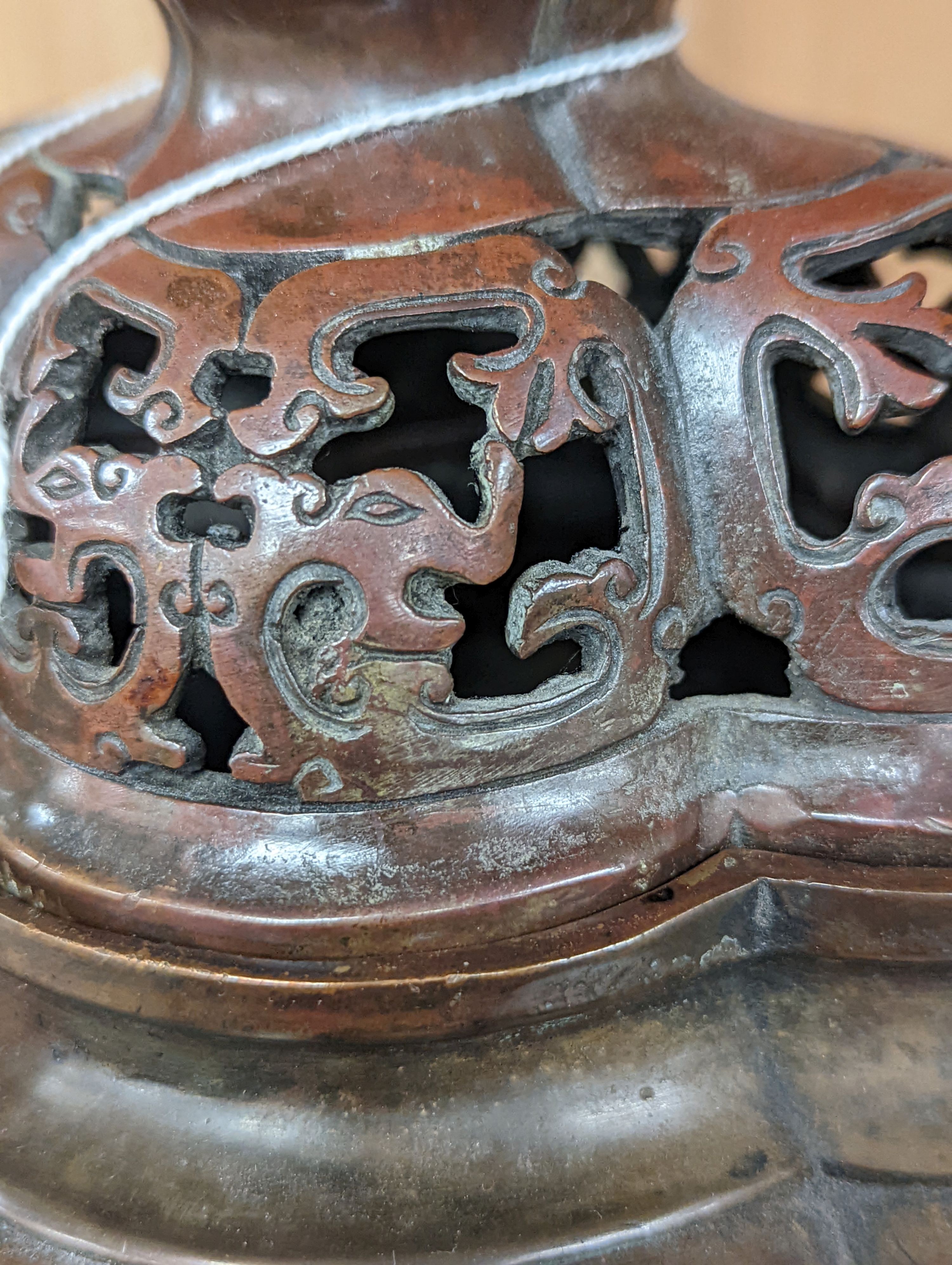 A 19th century Chinese bronze quatrefoil censer, with four character mark - 19cm high